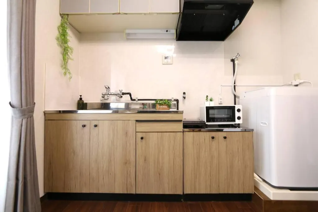 Апартаменты Guest House Kuromon403,徒歩すぐ黒門市場,難波,道頓堀近く Осака